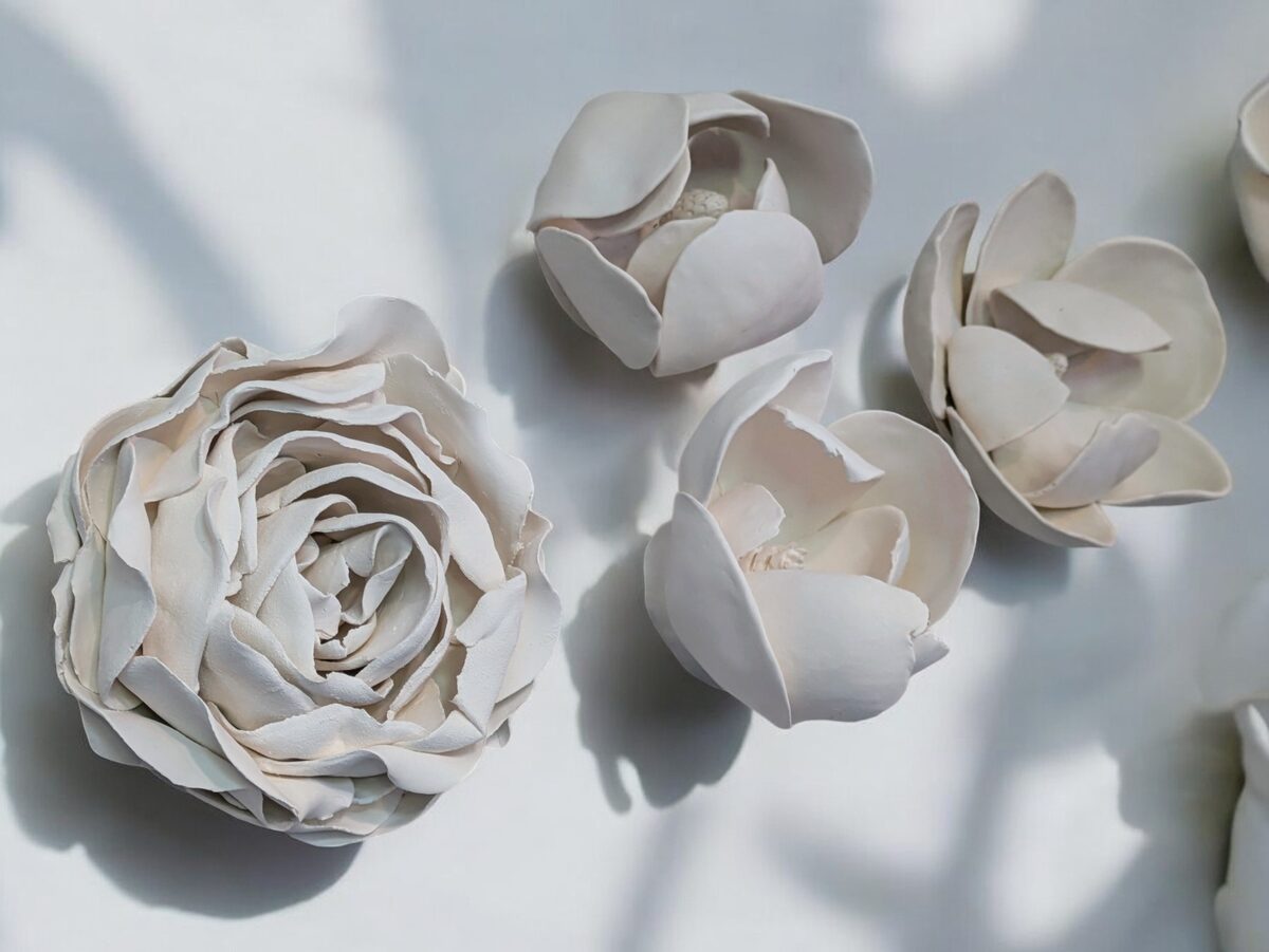 Loose handbuilt porcelain flower petals before assembly