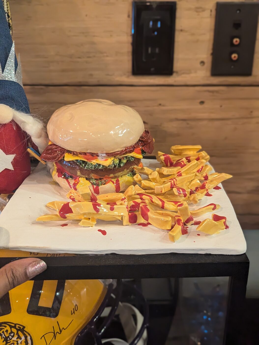 Sculptural ceramic burger and fries piece