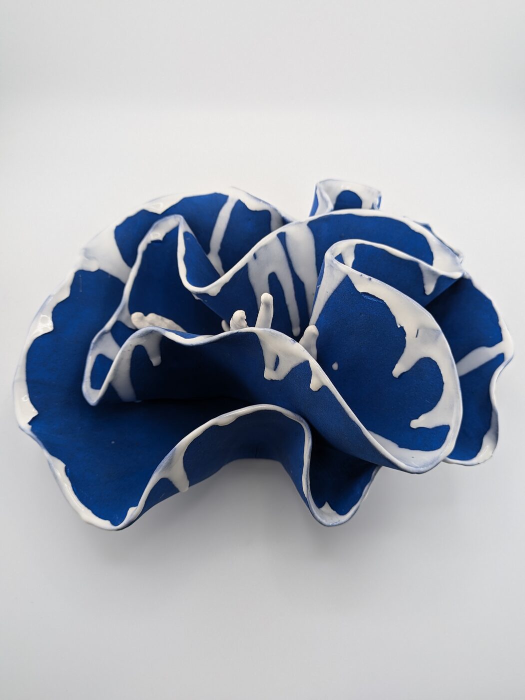 Handbuilt ceramic blue and white splatter piece