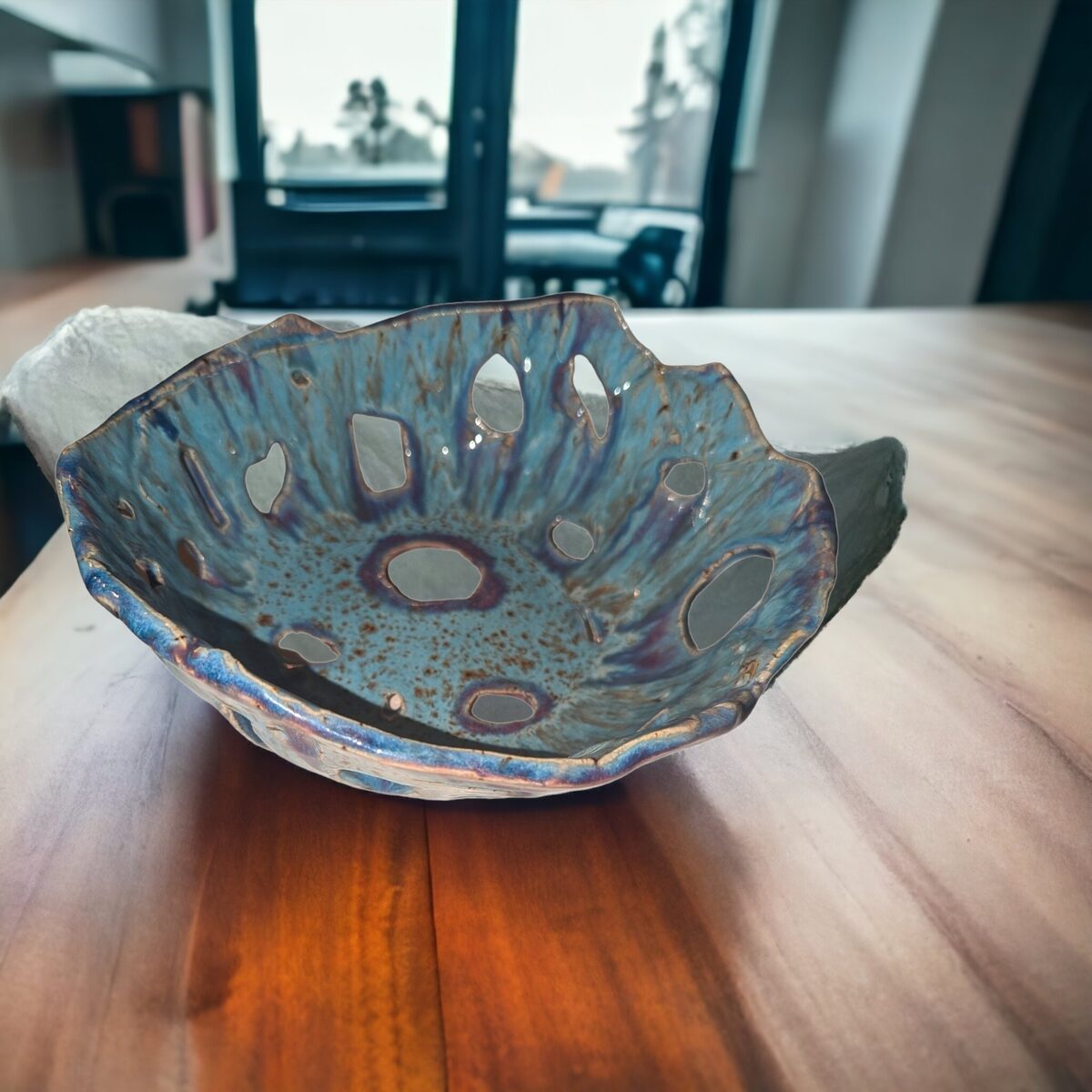 Scalloped blue and white ceramic bowl